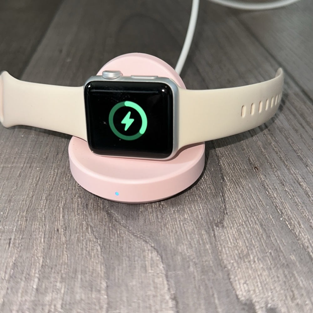 Pink Apple Watch charger.